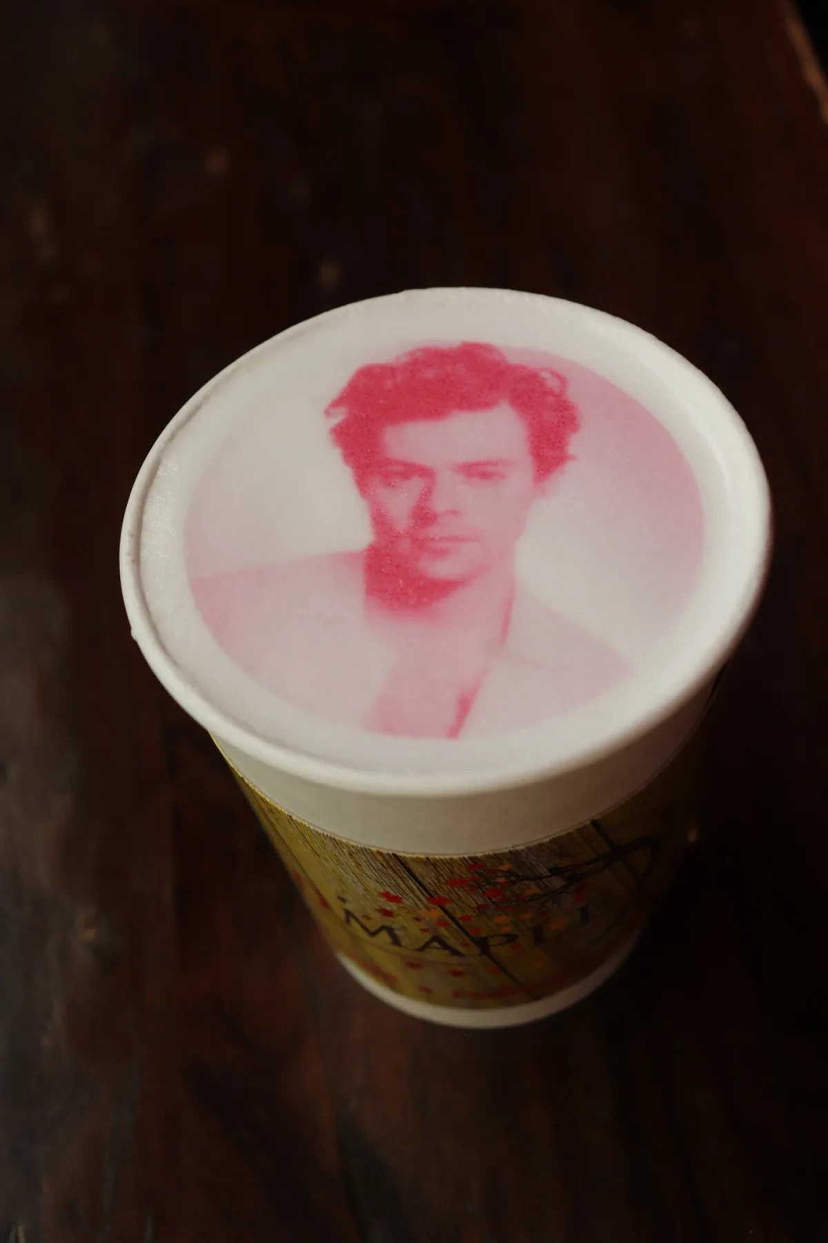 Barista-printed image on top of a to-go latte