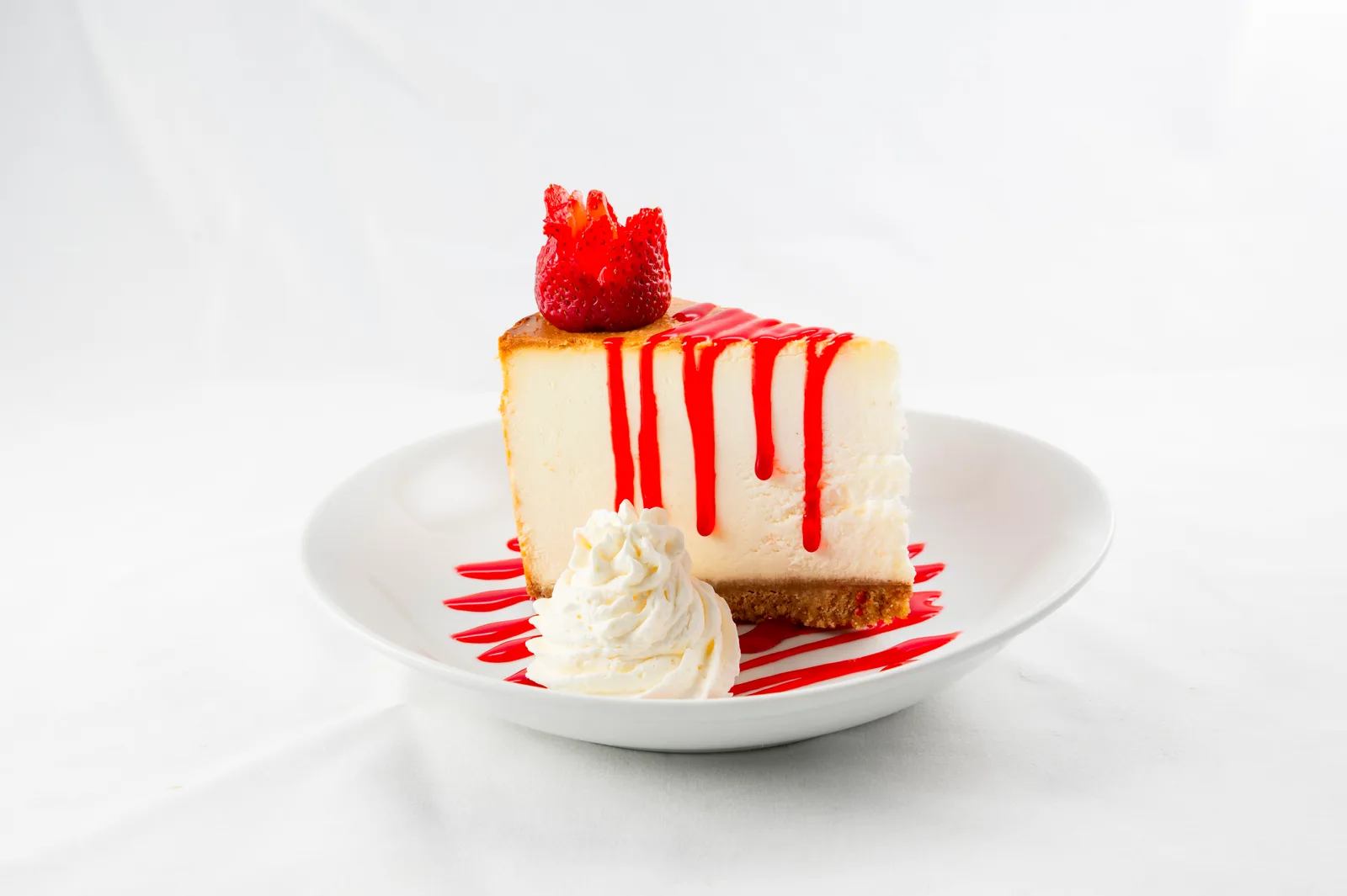 Cheesecake with strawberry coulis